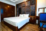 Bedroom NewDay Hotel
