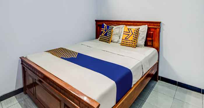 Kamar Tidur SPOT ON 90797 Sukun Syariah Homestay