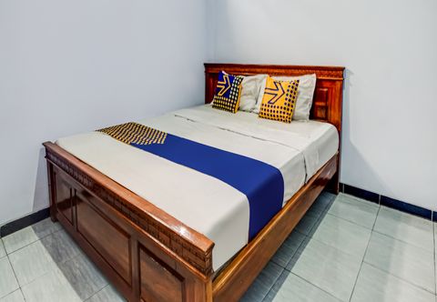 Bedroom SPOT ON 90797 Sukun Syariah Homestay