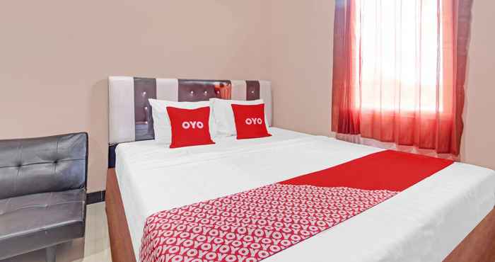 ห้องนอน OYO 90796 Hotel Mulya Indah