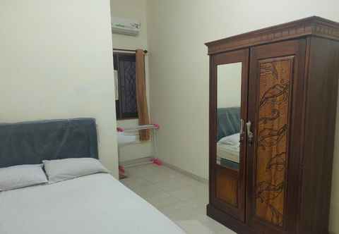 Bedroom OYO 90806 Cc3 Residences Family