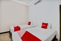 Kamar Tidur OYO 90807 Hotel Wisma Ck