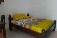 Kamar Tidur OYO 90810 Ravaya Homestay