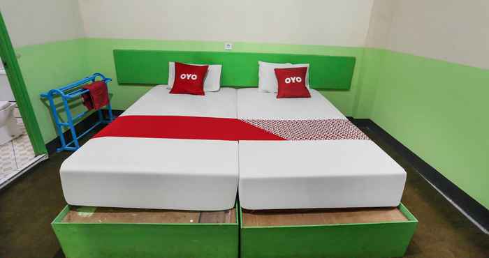 Kamar Tidur OYO 90825 Hotel Lizha 2