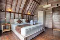 Phòng ngủ Megaland Bungalow Penida