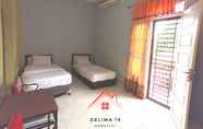 Kamar Tidur 6 Delima 19 Homestay