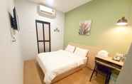 Bedroom 2 OYO 90399 Green Home Hotel (Syariah)