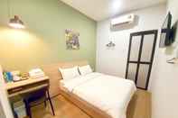 ห้องนอน OYO 90399 Green Home Hotel (Syariah)