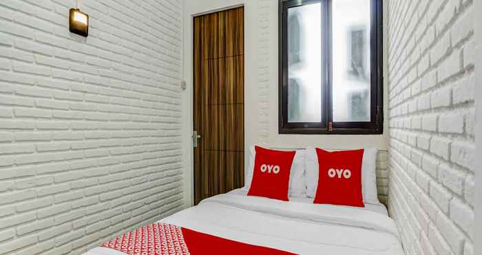 ห้องนอน OYO 90828 Ara Guest House