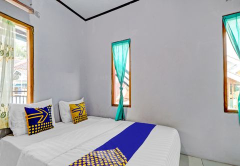 Bedroom OYO Homes 90849 Cibeunying Homestay Cibodas Maribaya