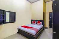 Kamar Tidur OYO 90852 Madani Guesthouse