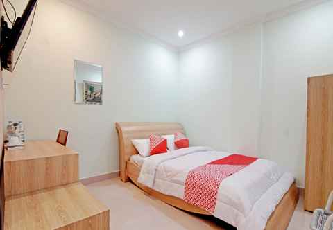 Bedroom OYO 90857 Baaraka Syariah Hotel