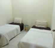 Bedroom 5 OYO Home 90419 Sahar Guesthouse