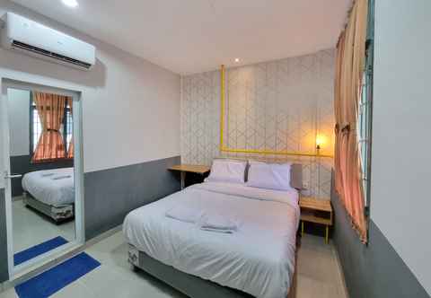 Bedroom Capital O Millenium Inn 2 Medan