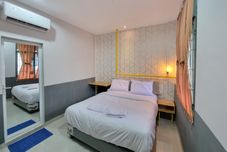 Bedroom Capital O 90874 Millenium Inn 2