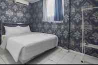 Kamar Tidur OYO 90873 Orchid Guesthouse