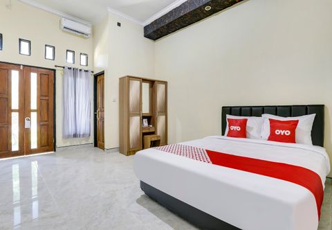 Bedroom SPOT ON 90882 Sari Homestay Near Garuda Wisnu Kencana