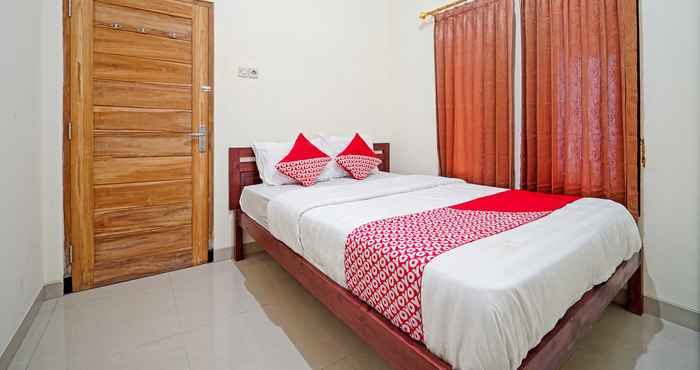 Bedroom OYO 90869 Happy Homestay Syariah