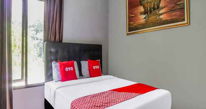 ห้องนอน OYO 90887 Villa Sri Rejeki 