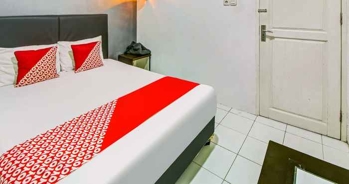 Kamar Tidur OYO 90906 Guest House Idm Inn 