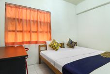 寝室 SPOT ON 90894 Icarus Home Syariah