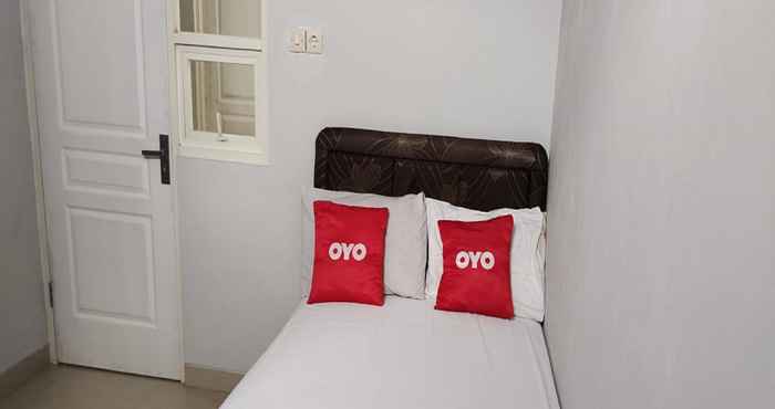 ห้องนอน OYO 90901 Taman Daun