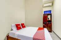 Phòng ngủ Super OYO 90927 Homestay Tentrem 2