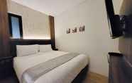 Kamar Tidur 3 Grand Plaza Boutique Hotel