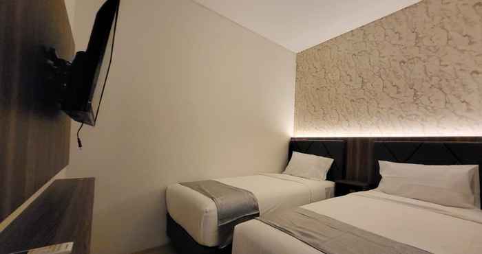 Bilik Tidur Grand Plaza Boutique Hotel