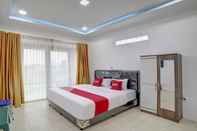 Kamar Tidur OYO 90920 Agave Hotel