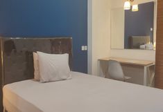 Bedroom 6 Minimalist Studio Apartment at Tamansari Panoramic Apartment By BSMS HOME