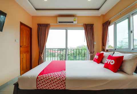 ห้องนอน OYO 1027 Patumnak Beach Guesthouse