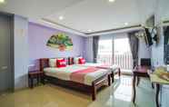 Kamar Tidur 3 OYO 1027 Patumnak Beach Guesthouse