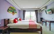 Kamar Tidur 4 OYO 1027 Patumnak Beach Guesthouse