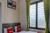 ห้องนอน OYO 90940 Guesthouse Colombus G12