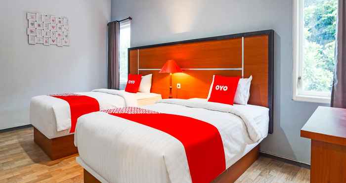 ห้องนอน OYO 90931 Swun Stay Guest House & Coworking Space