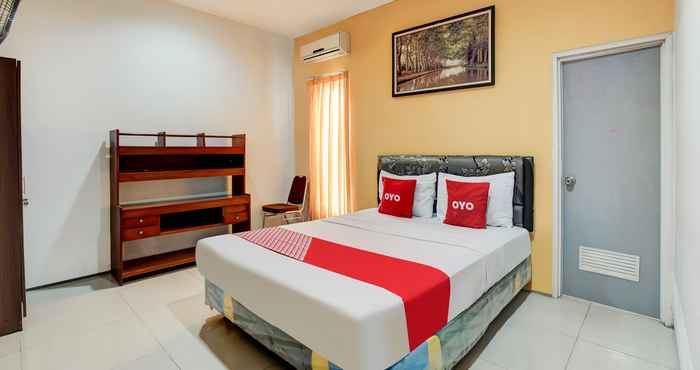 Bedroom OYO 90935 Rumah Kost Metroliving