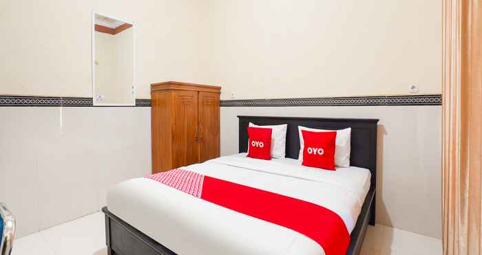 Bedroom OYO 90936 Dien Homestay Syariah