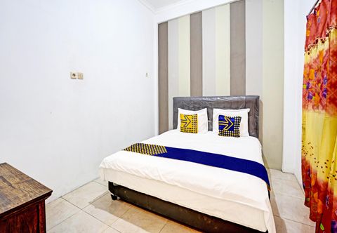 Bedroom SPOT ON 90943 Mochi 88 Homestay
