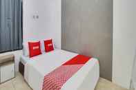 Kamar Tidur SUPER OYO 90950 Forzando House