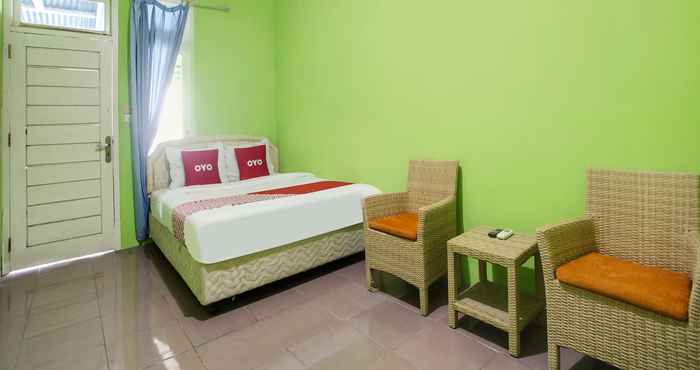 Kamar Tidur OYO 91005 Cottage Putra Mutun Beach