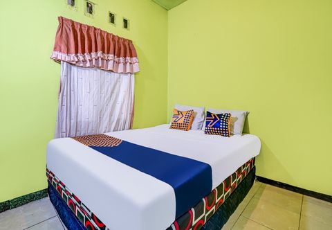 臥室 OYO Homes 90997 Eco Tourism Desa Cibodas Babakan Gentong 2 Syariah