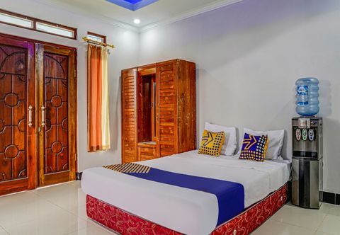 臥室 OYO Homes 91014 Eco Tourism Desa Cibodas Areng 2 Syariah