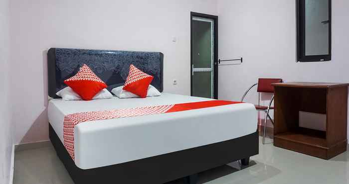 Bedroom OYO 90965 Homestay Madu Makassar