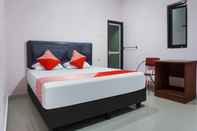 Bedroom OYO 90965 Homestay Madu Makassar