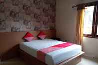 Kamar Tidur OYO 90971 Rrr Guesthouse