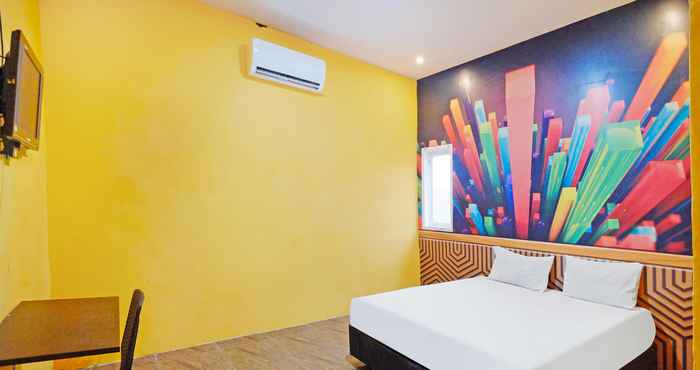 Bedroom OYO 90977 Wisma Pelangi Palopo