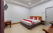 Kamar Tidur 4 OYO 1044 Vassana Resort​