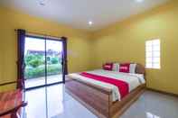 Bedroom OYO 1044 Vassana Resort​