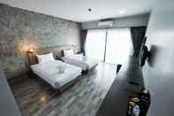 Kamar Tidur Little Loft Hotel